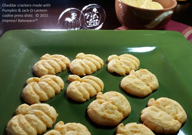 Cheddar crackers made with Pumpkin & Jack-O-Lantern cookie press disks © 2015 Impress! Bakeware™