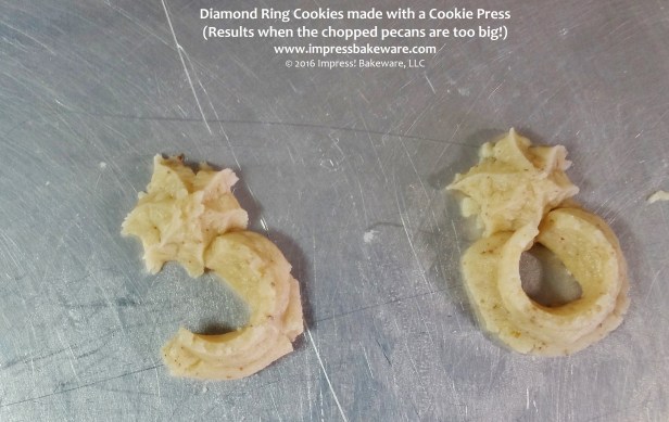 Diamond Ring Cookies made with a Cookie Press - results when chopped pecans are too big © 2016 Impress! Bakeware, LLC