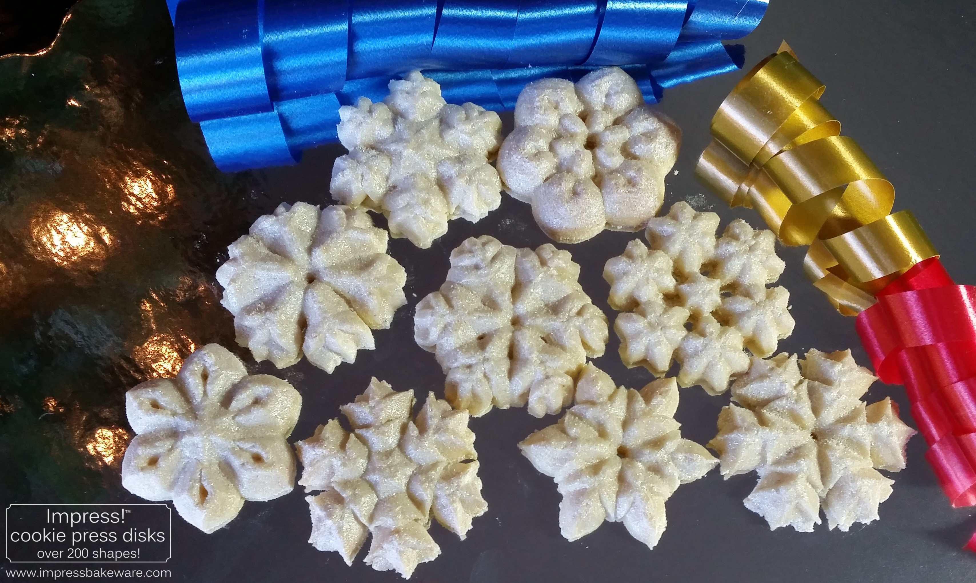 Sparkling Snowflake Almond Spritz Cookies © 2016 Impress! Bakeware, LLC b cookie press.jpg