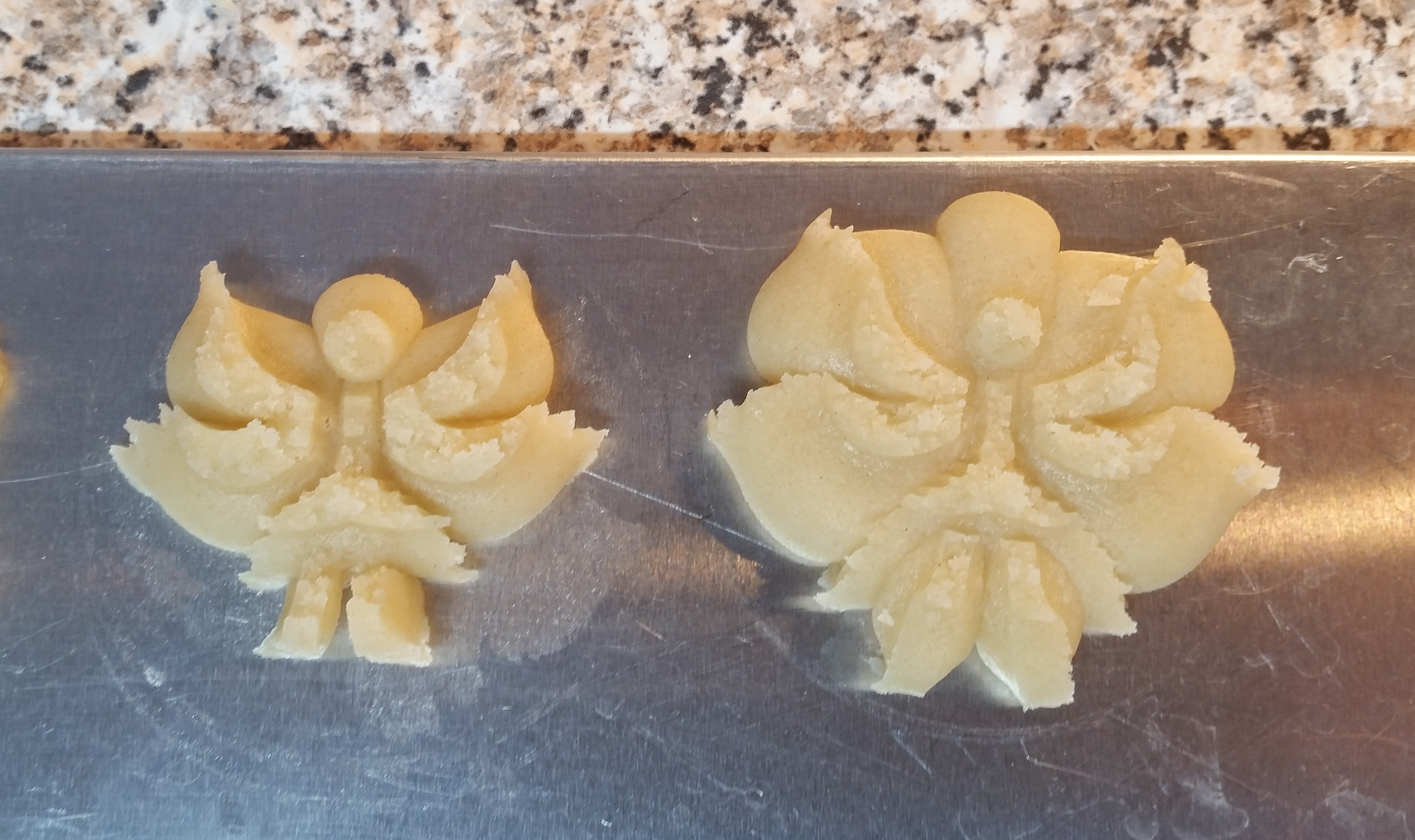 Snickerdoodle Spritz Angels © 2019 Impress! Bakeware, LLC a