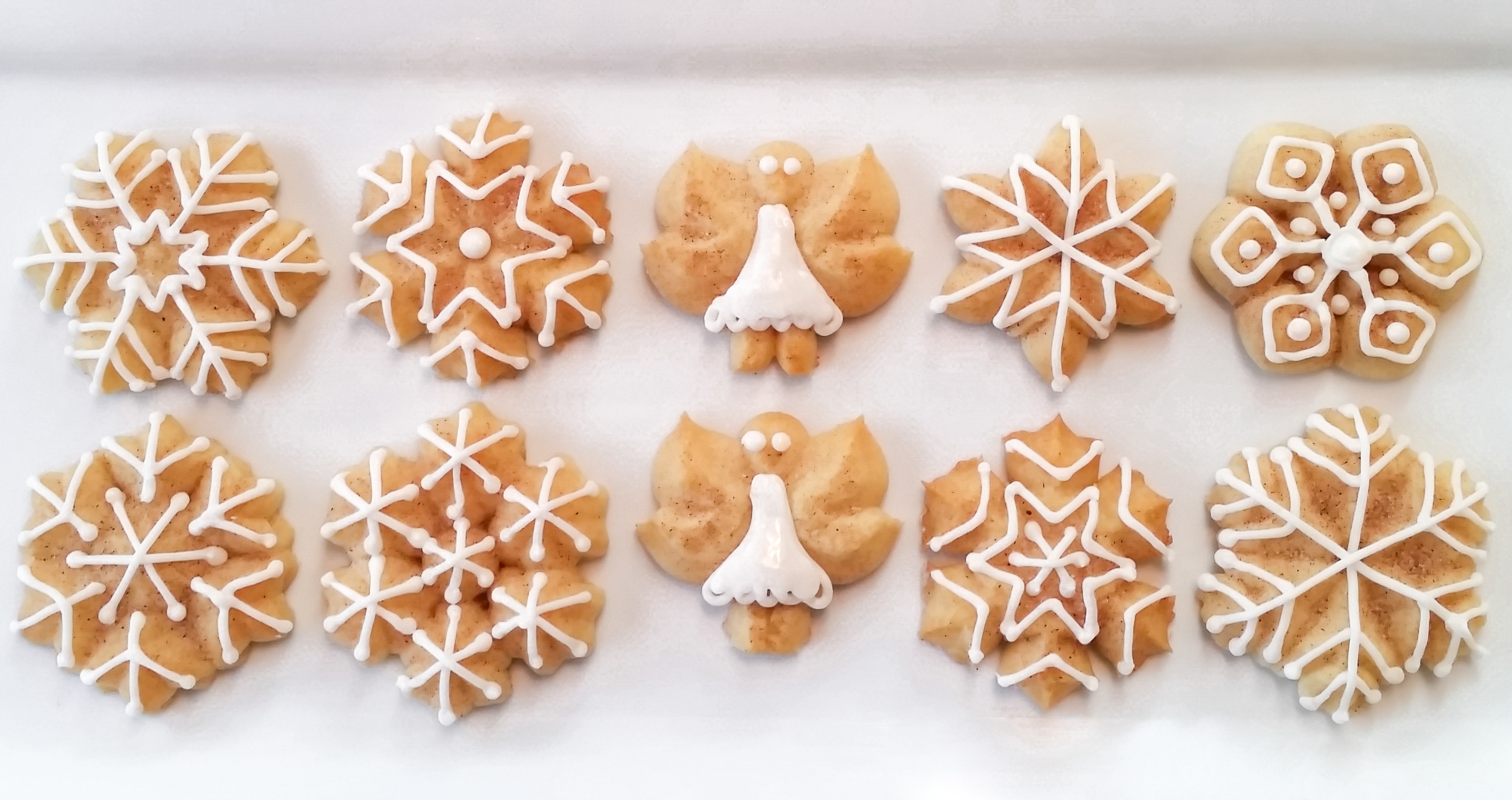 Snickerdoodle Spritz Snowflakes and Angels © 2019 Impress! Bakeware, LLC i