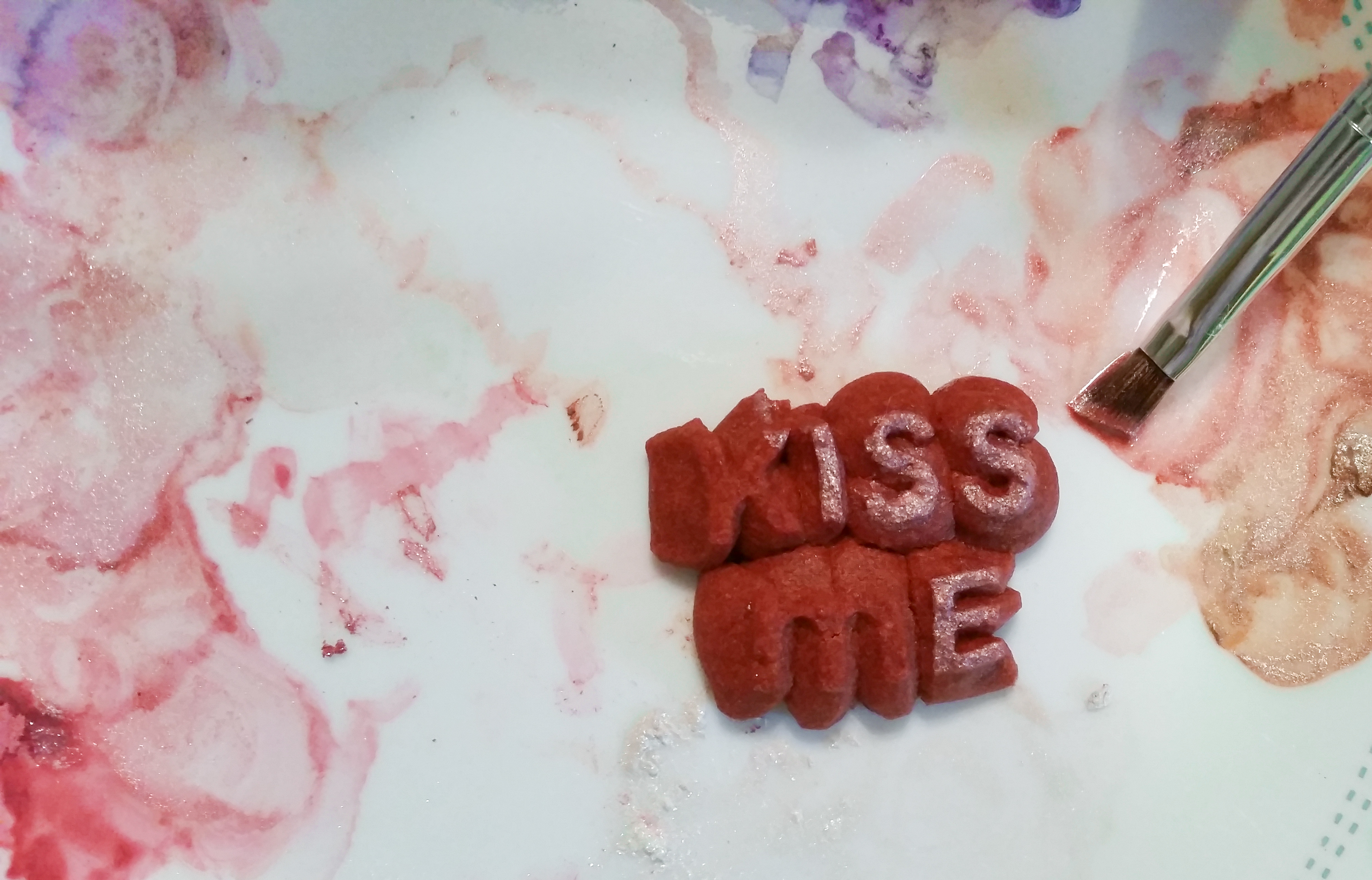 Red Velvet Valentine’s Day Spritz Cookies © Impress! Bakeware, LLC decorating