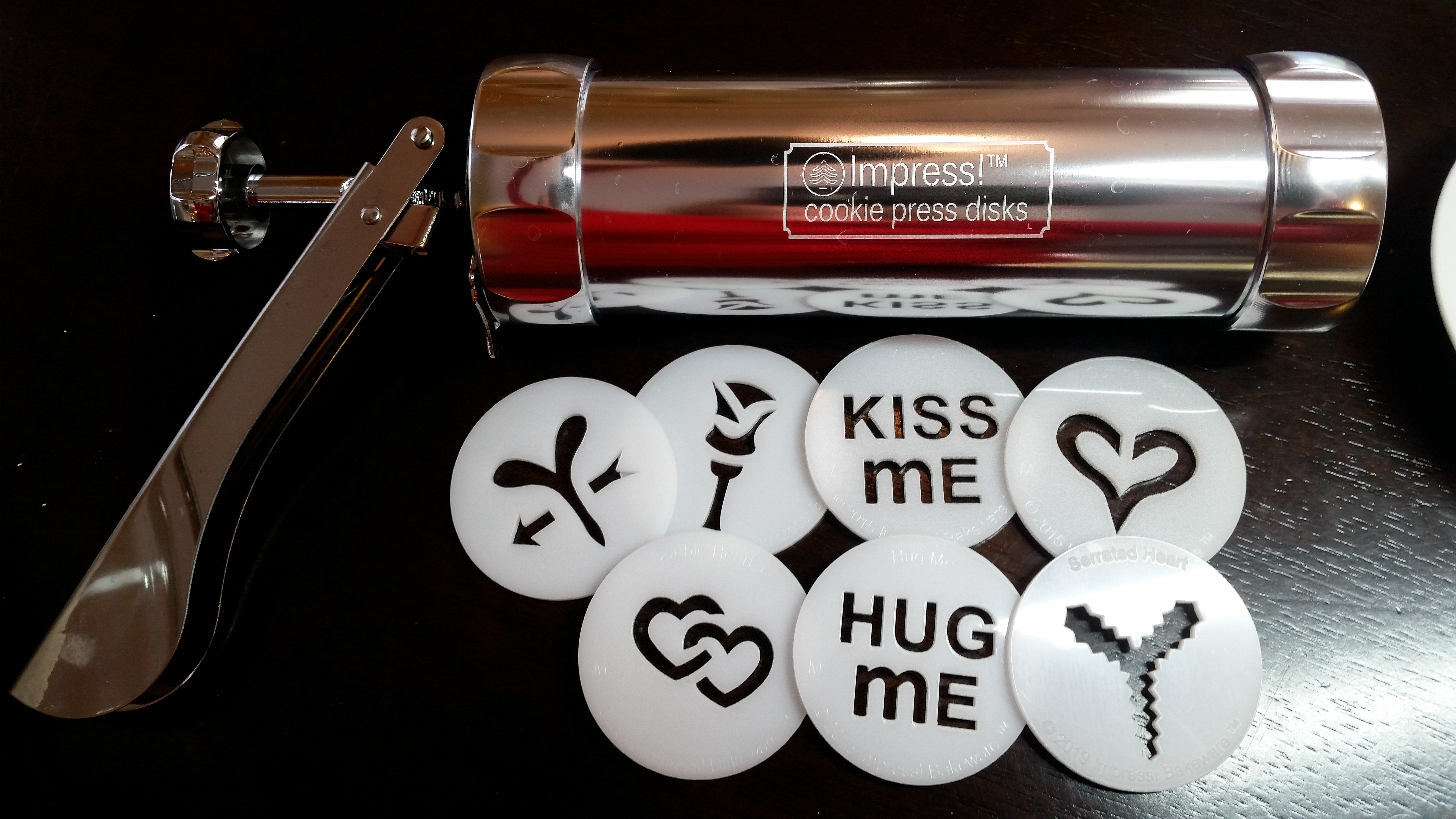 Valentine’s Day cookie press disks © Impress! Bakeware, LLC