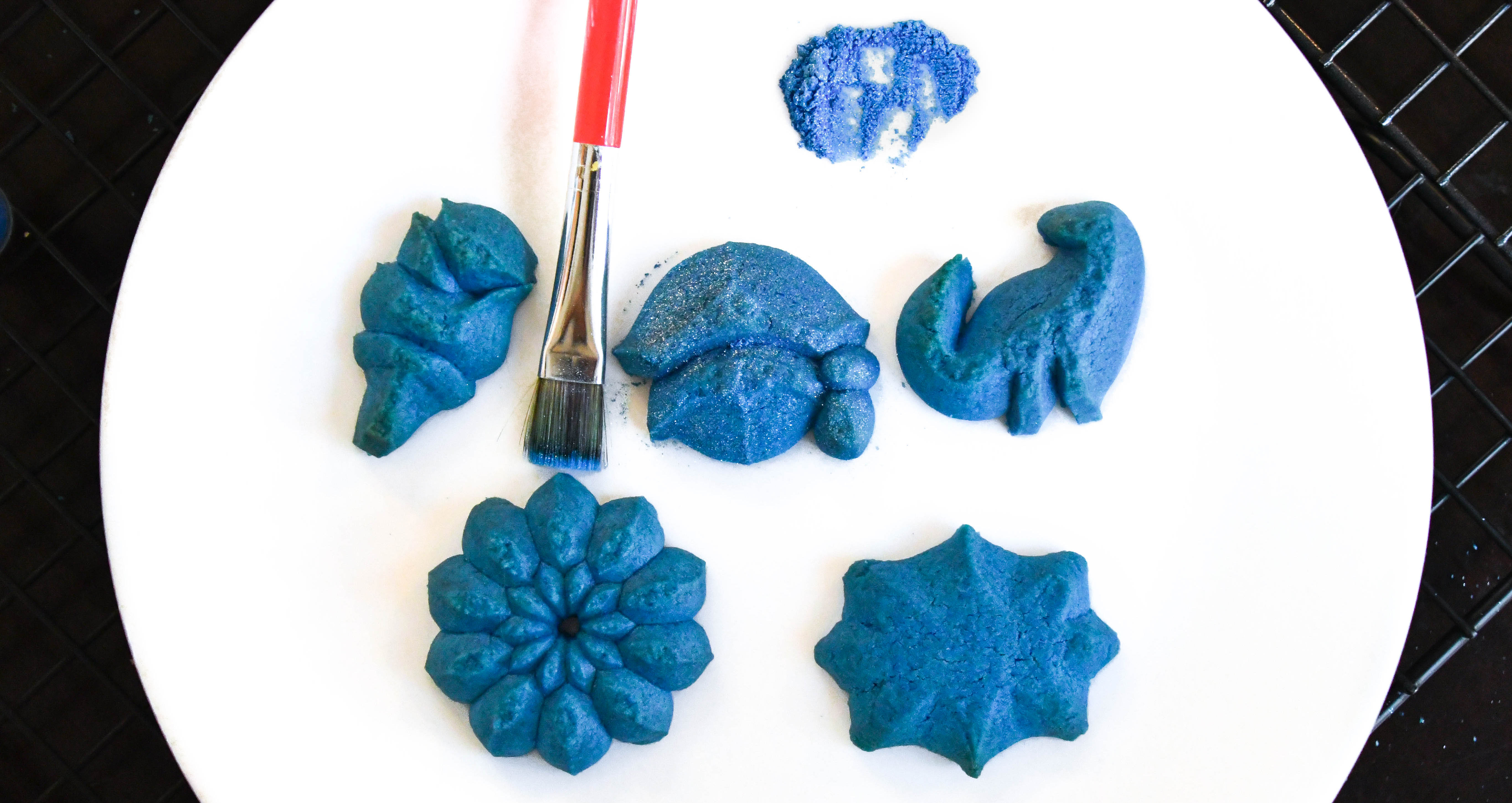 Decorating Spritz cookies ab © Impress! Bakeware, LLC