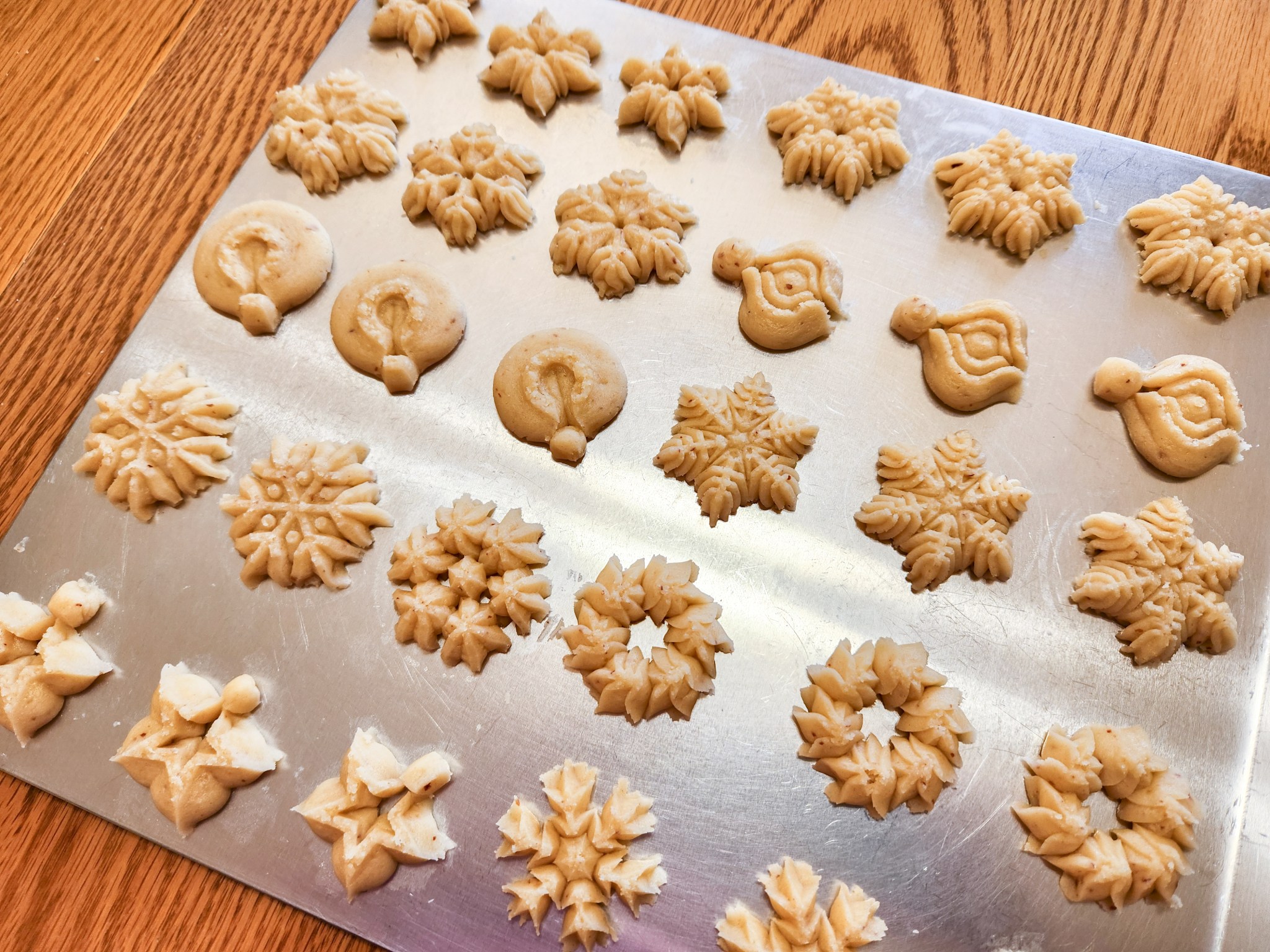 Raspberry-Almond Thumbprint Snowflake Spritz Cookies! – creative cookie ...