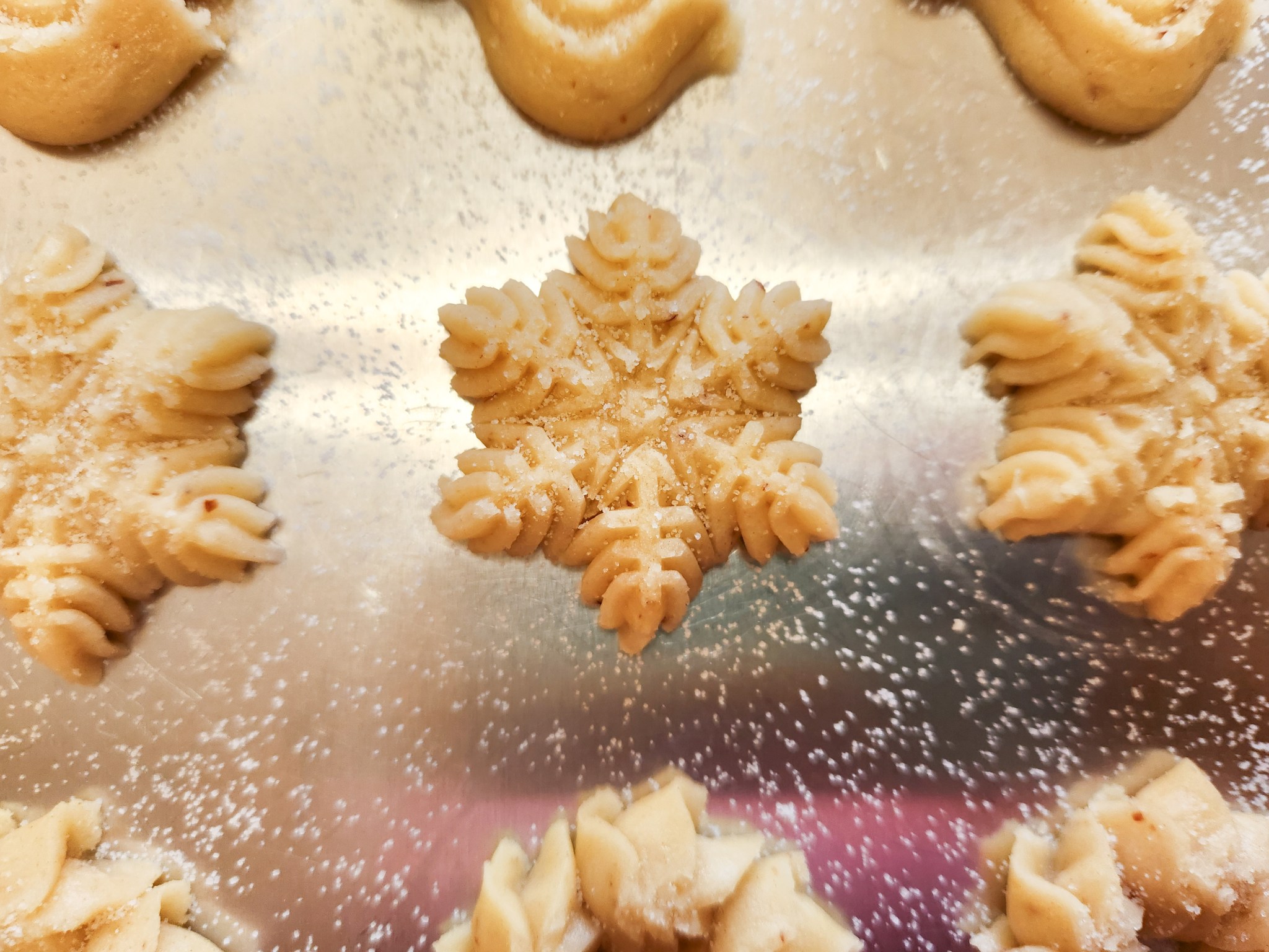 Raspberry-Almond Thumbprint Snowflake Spritz Cookies! – creative cookie ...